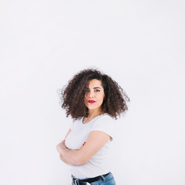 Confident woman with folded arms