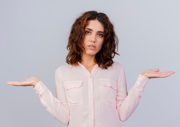 Free photo confident young caucasian woman stands with open hands