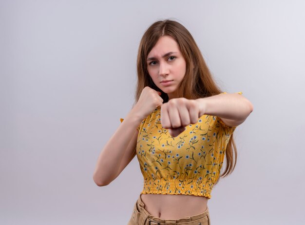 Free photo confident young girl doing boxing gesture   with copy space