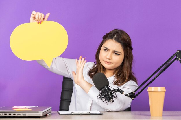 Confused girl holding idea bubble and gesture no High quality photo