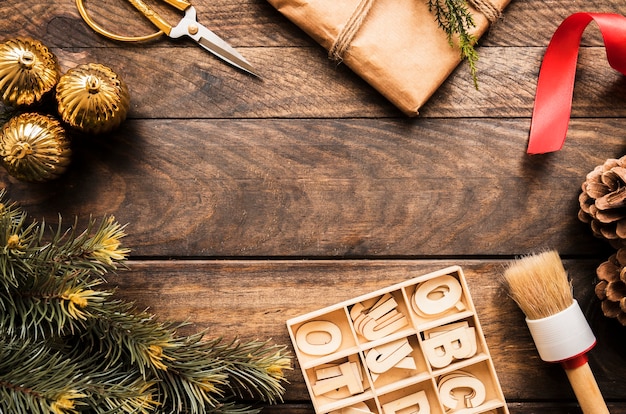 Coniferous twig, present box and letters