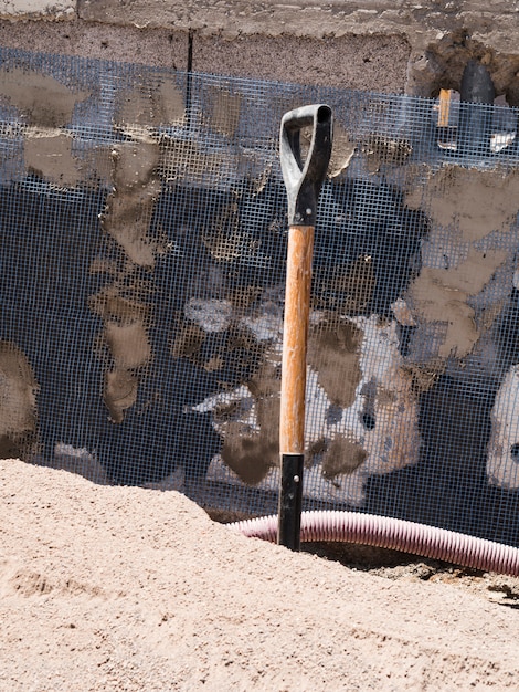 Free photo construction site with shovel handle