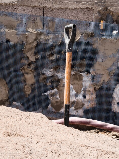 Construction site with shovel handle