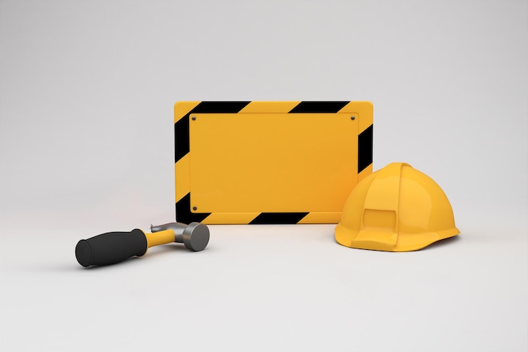 Free Photo construction tools and safety equipment on white background