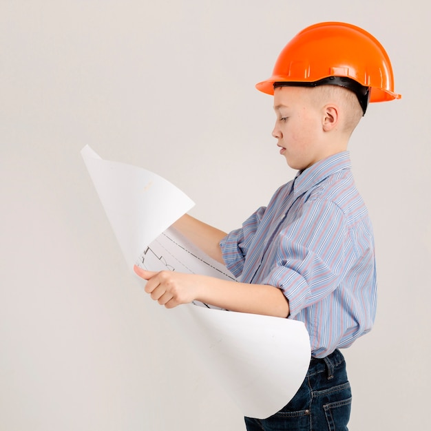 construction worker holding project side view