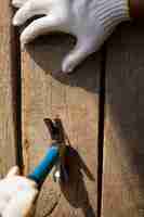 Free photo construction worker using hammer at job site