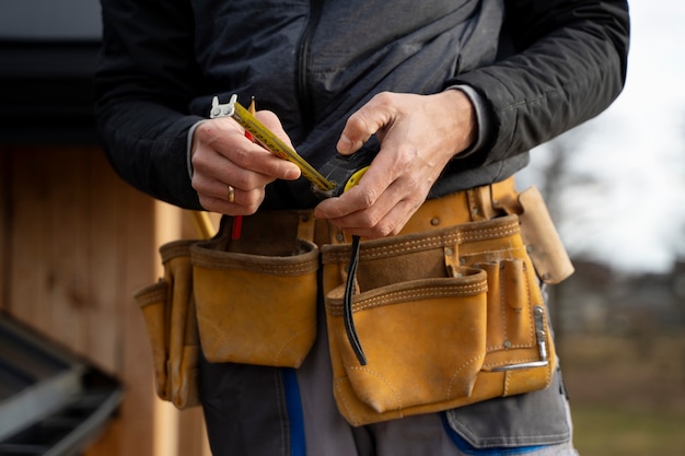 Free photo construction worker wearing belt