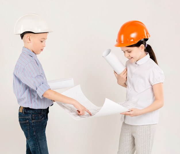 Construction workers looking at project