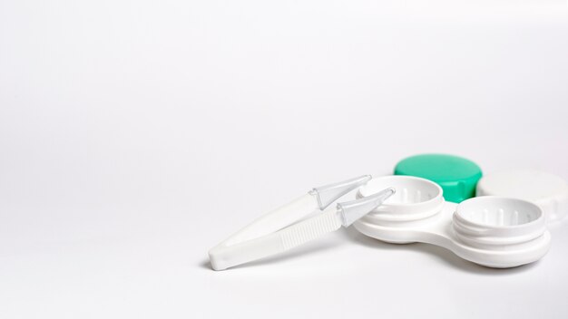 Contact lenses case with copy space and tweezers