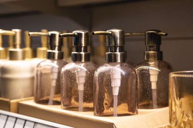 Free photo containers for liquid soap or shampoo with a dispenser is sold in a supermarket