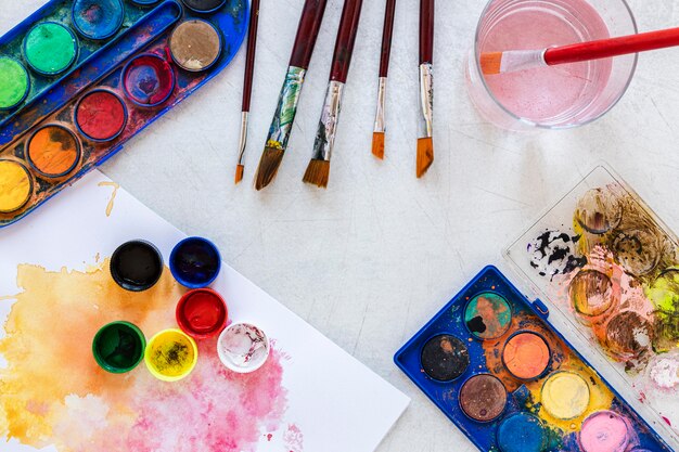 Containers of paint colors copy space top view