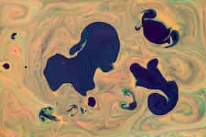 無料写真 現代美術のダークブルーの塗料スポットの混合アート流体の背景