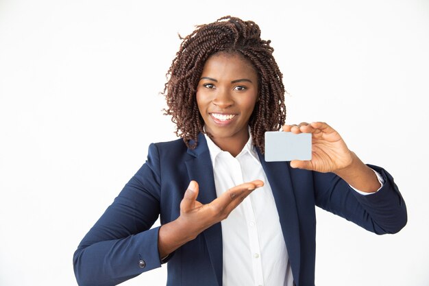 Content businesswoman showing card