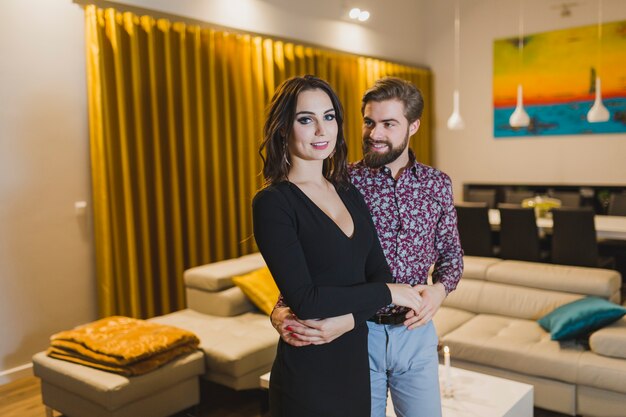 Content couple in dance posing at camera