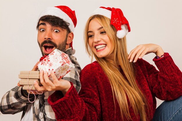 Content couple with presents