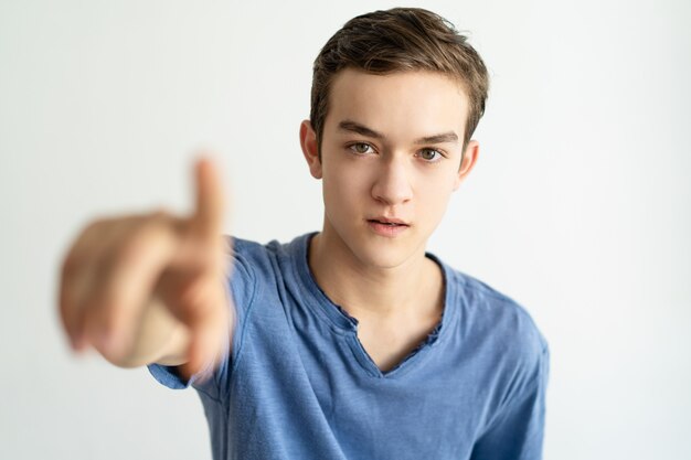 Content curious young man using invisible touchscreen