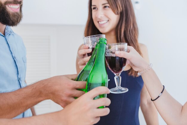 Content friends cheering with drinks