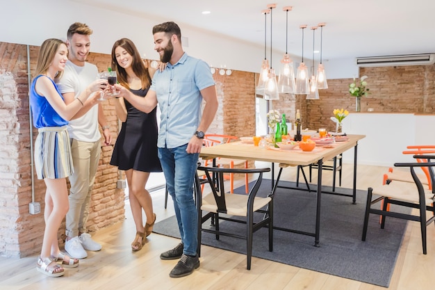 Content friends enjoying party at home