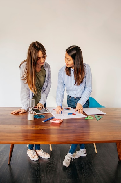 Content girlfriends exploring statistics