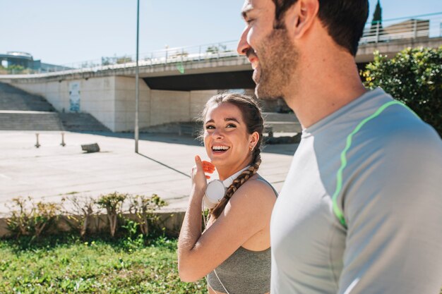 Content laughing couple after workout