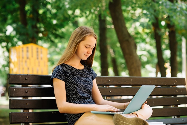 Content student using laptop for studies