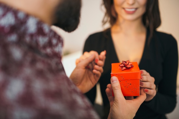 Free photo content woman having surprise from boyfriend