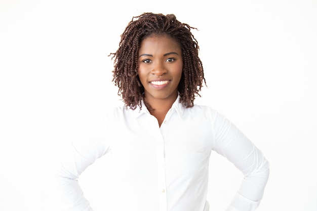 Free photo content young businesswoman smiling at camera