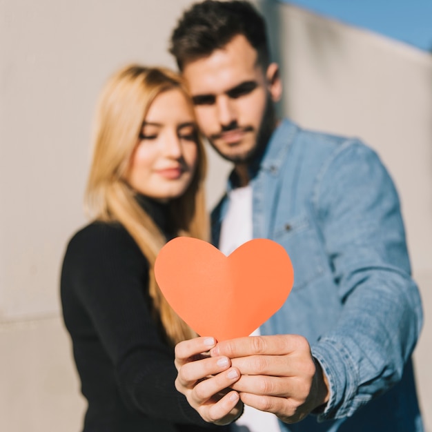 Free photo content young people posing with heart