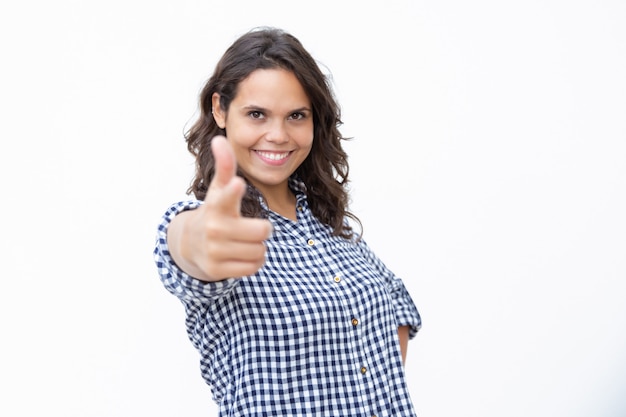 Content young woman showing finger gun symbol