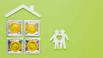 Free photo contraception method arrangement on green background