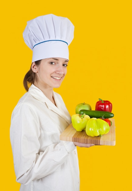 Cook woman with vegetables