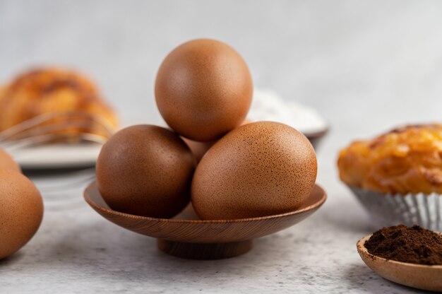 Cooked bread with ingredients Eggs and tapioca flour in a cup.