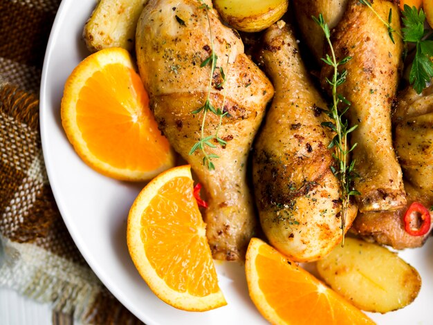 Cooked chicken legs with herbs