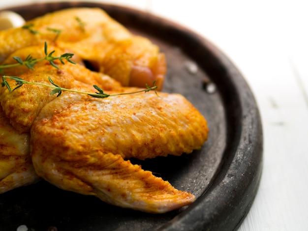 Cooked chicken wings with herbs