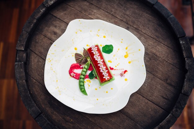 "Cooked vegetables served on white plate"