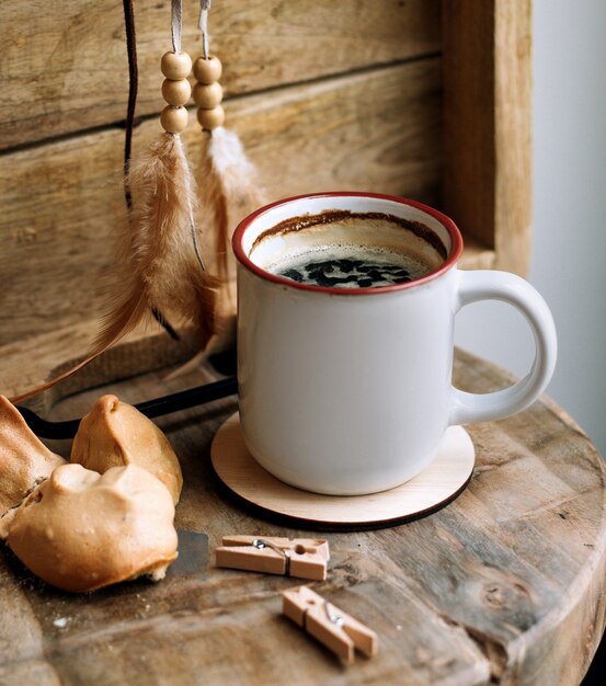 Cookie with cup of coffee