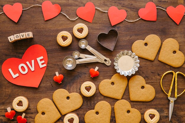 Cookies and bakeware near hearts