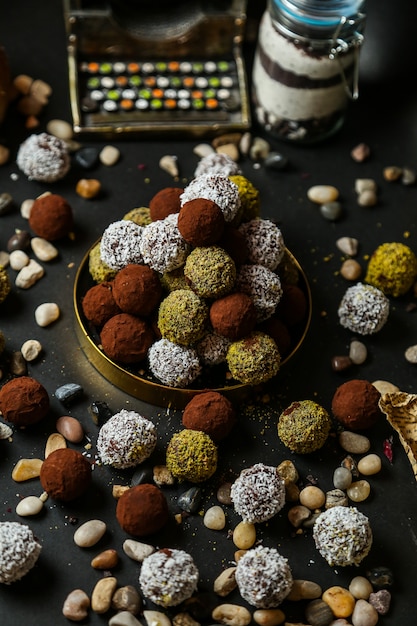 Free photo cookies covered in coconut chips and fried nuts