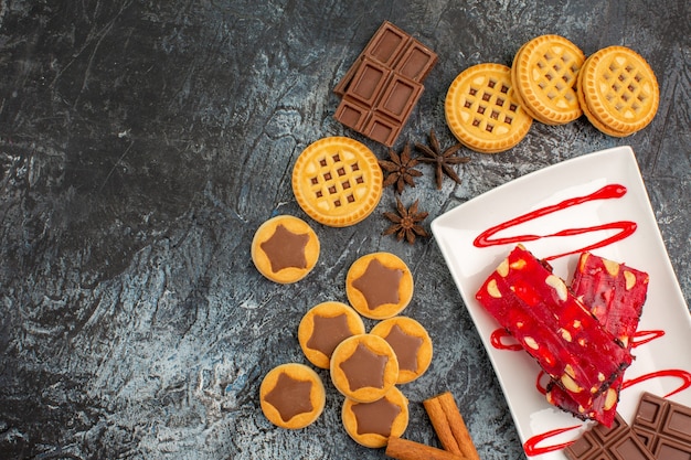 cookies and a plate of chocolate on grey