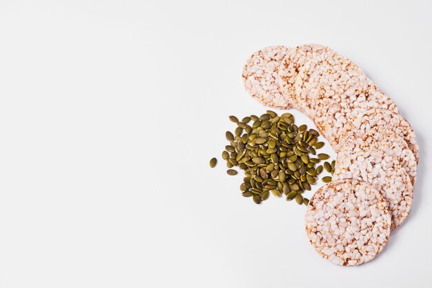 Cookies with seeds on white.