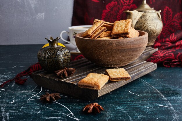 Cookies in a wooden cup. 