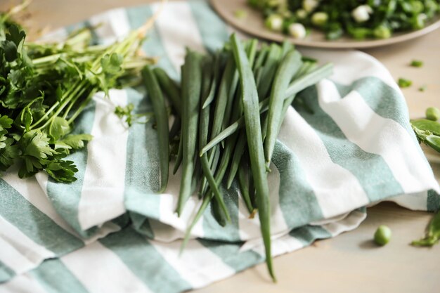 Cooking. Fresh greens on the table