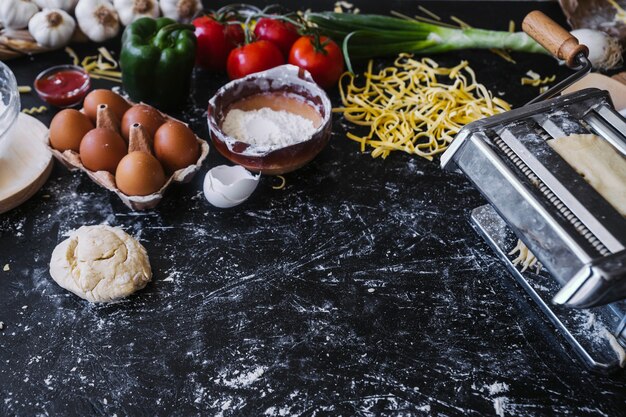 Cooking ingredients near pasta machine