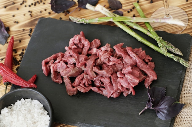 Free photo cooking raw meat