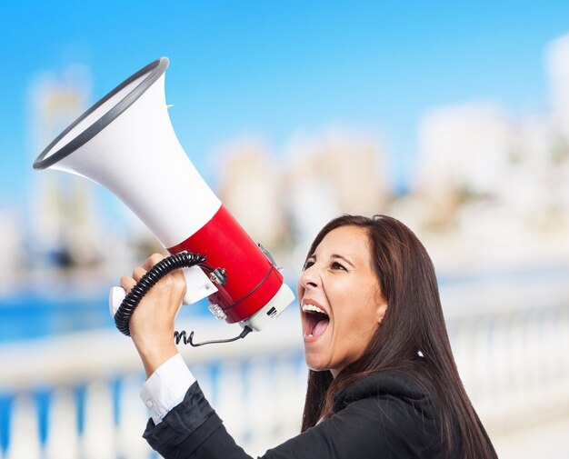 cool business-woman with megaphone