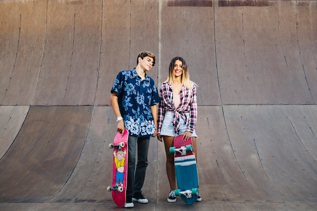 Cool friends posing with skates