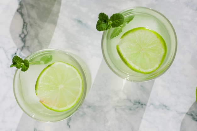 Free photo cool lime drink in glasses