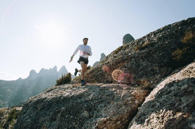 Cool man with tattoos ultra trail runner