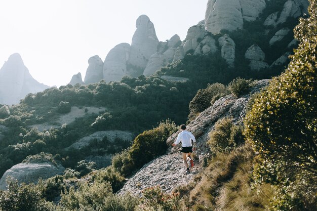 Cool man with tattoos ultra trail runner