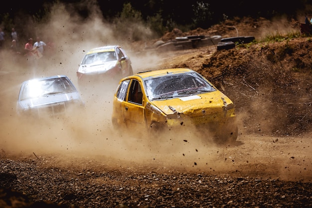 A cool shot of cars racing on a dirt road